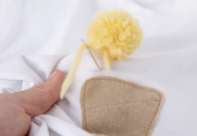 Pompom Nähideen Pompom anbringen Pompom Nähideen Pompom anbringen
