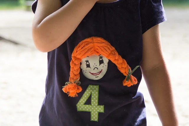 Kindershirt mit Pippi Langstrumpf Applikation Kindershirt mit Pippi Langstrumpf Applikation
